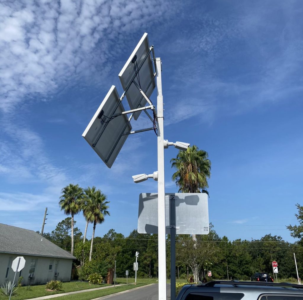 Camera with solar panel